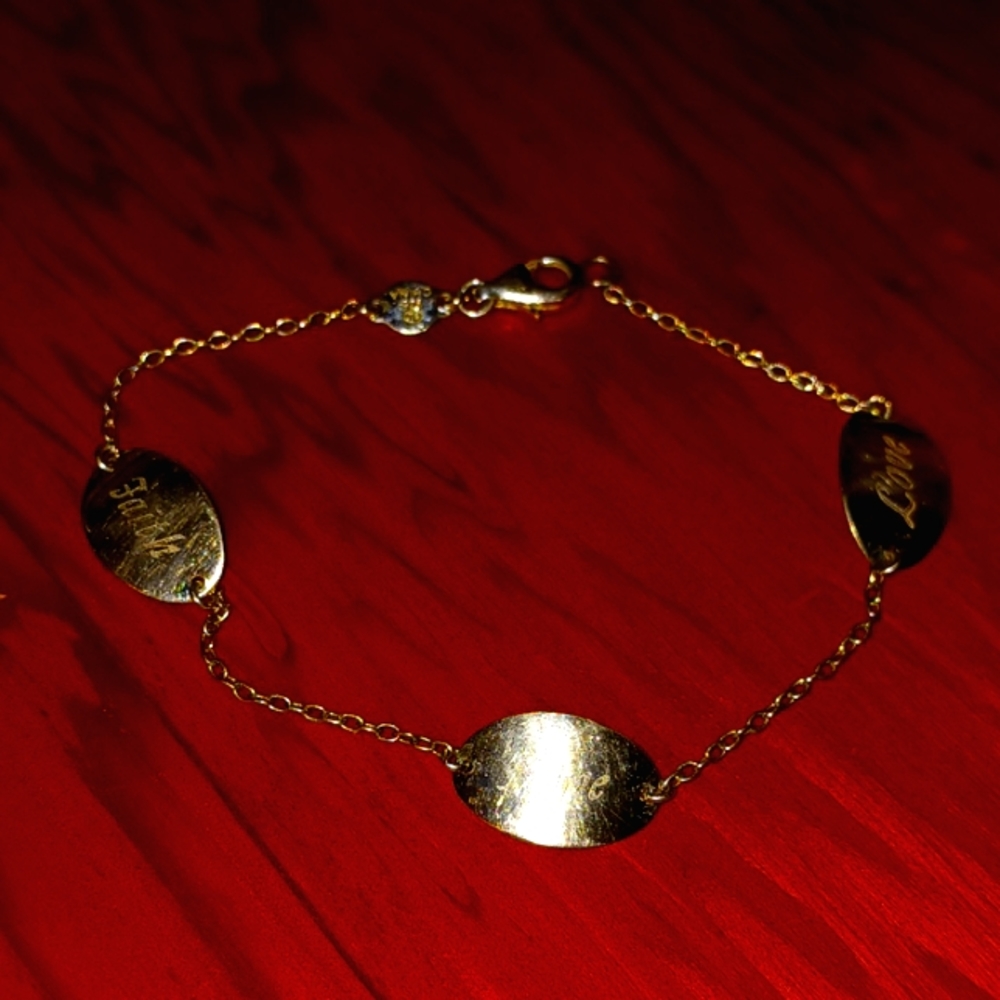 925 Bracelet Says Faith,Love,and Hope on it